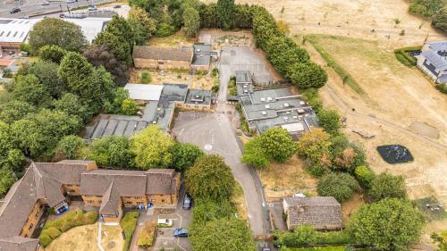 Former Henley Centre, Saunders Close, Kettering, NN16